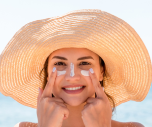 Model with big hat and sunscreen 